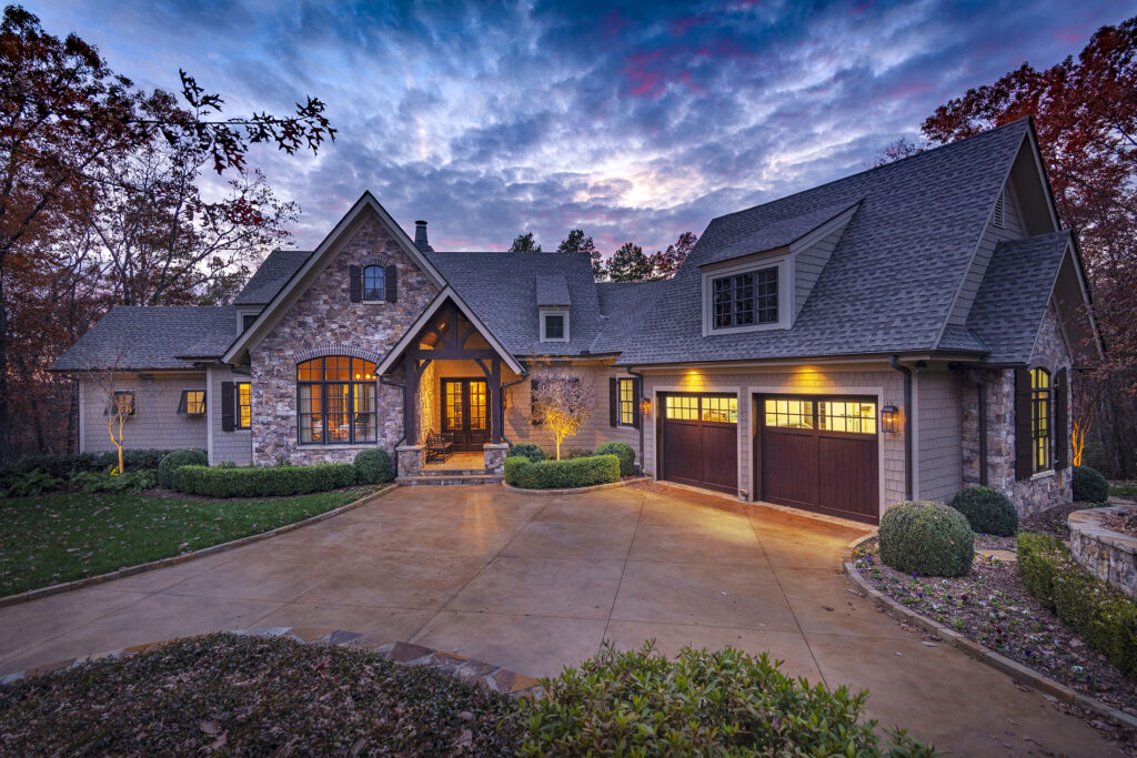 Photo of exterior of large luxury residential property at twilight photographed by Adept Media Real Estate Photography in Asheville and Western North Carolina.